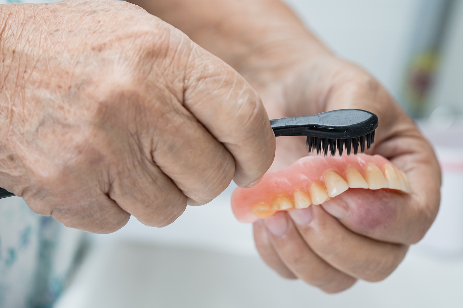 cleaning a set of dentures