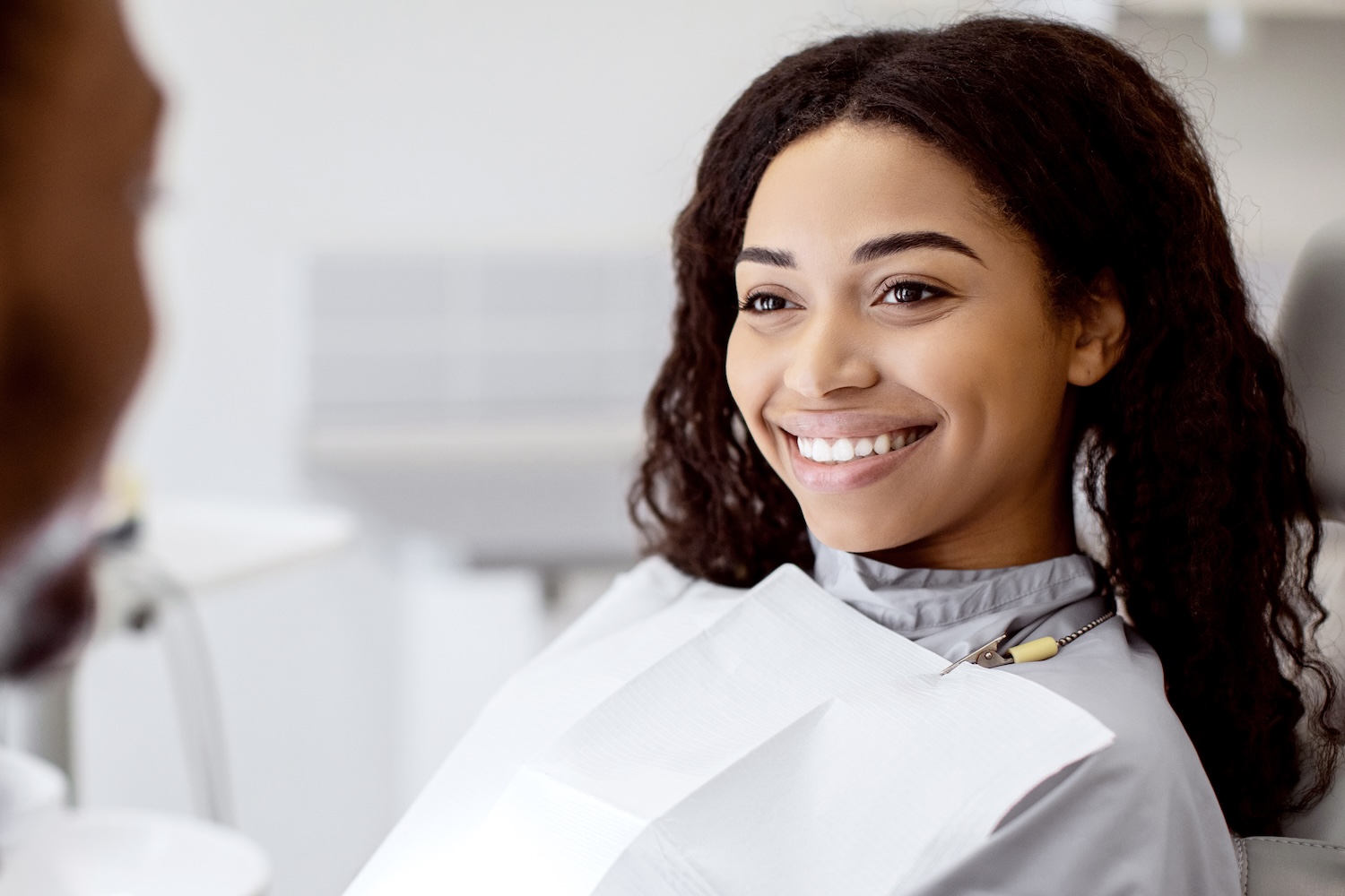 Smiling dental patient.
